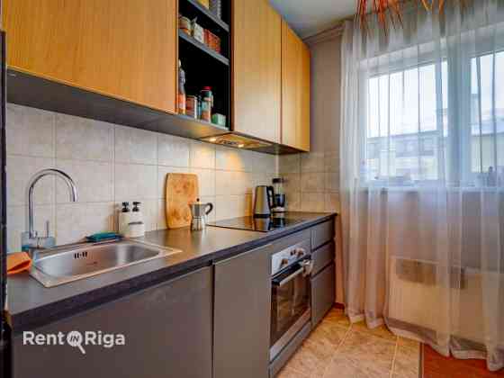 Apartment in a new development with underground parking and a storage room.  The layout includes a l Рига