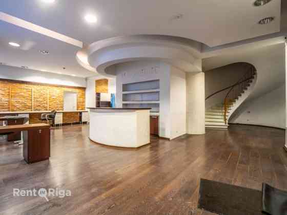 Salon or retail premises with large display windows.  Previously, the premises housed a hairdressing Rīga