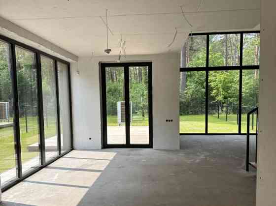 Продаётся стильный и энергоэффективный дом дуплекс премиум-класса в Меллужи Юрмала