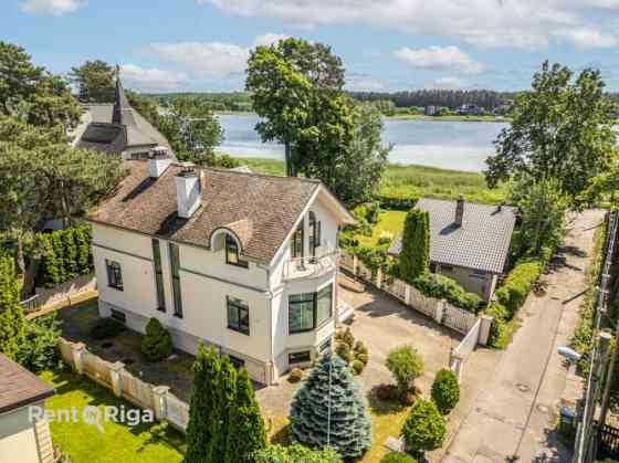 Продается красивый дом в Лиелупе с видом на реку. Тихий, окруженный природой Jūrmala