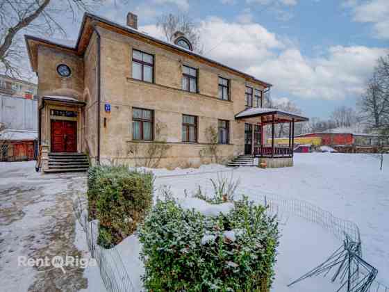 A stylish, sunny apartment in a private house with a garden.  The apartment occupies the entire seco Rīga