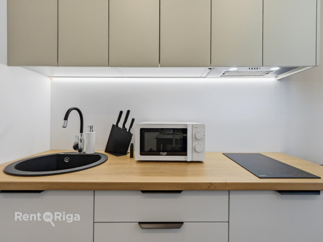 Tiek pārdots renovēts 2-istabu dzīvoklis ar atsevišķu virtuvi. Dzīvoklis pārdodas ar Rīga - foto 14