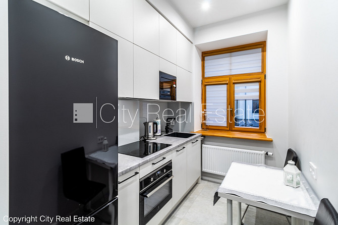 Эта квартира сдается в аренду посуточно (краткосрочная аренда), стоимость аренды Рига - изображение 13