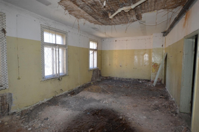 Premises located on the ground floor of a wooden house.  The total area of the premises is 427.6 m.  Рига - изображение 5