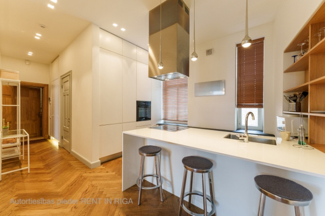 Furnished 2-room apartment in a renovated building at Brīvības Street 46. Entrance and windows face  Рига - изображение 9