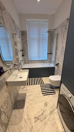 В самом центре города, в полностью реновированном доме сдаётся  новая 2-х Рига - изображение 9