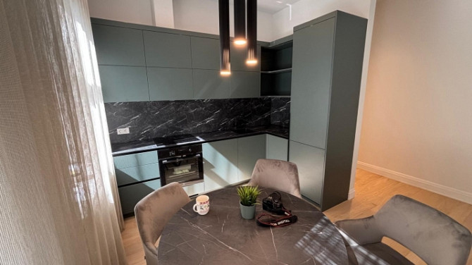 В самом центре города, в полностью реновированном доме сдаётся  новая 2-х Рига - изображение 3