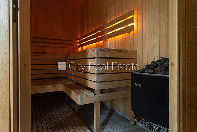 Частный дом, благоустроенная озеленённая территория, подъездная дорога покрыта Рига - изображение 11