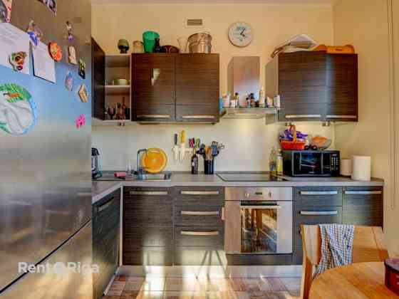 Эксклюзивная квартира с камином, террасой 106 кв.м и 2 подземными парковочными Rīga