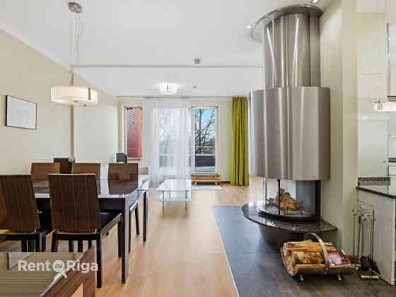 Spacious and high-quality 4-room apartment with a terrace for sale in Šampēteris.  The total interio Рига