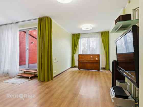 Spacious and high-quality 4-room apartment with a terrace for sale in Šampēteris.  The total interio Rīga