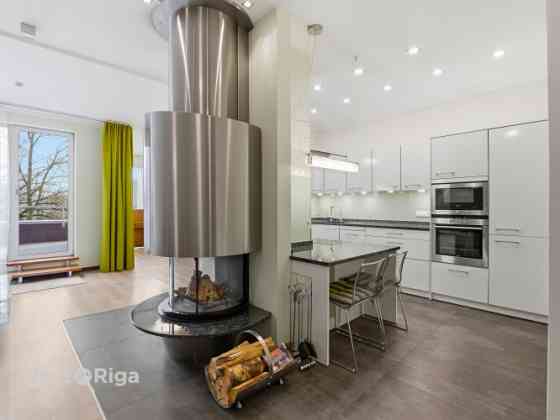 Spacious and high-quality 4-room apartment with a terrace for sale in Šampēteris.  The total interio Rīga