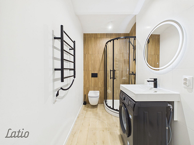 Moderns 2 istabu dzīvoklis Rīgas centrā  blakus parkiem, ar privātu autostāvvietu.
Tikko Rīga - foto 9