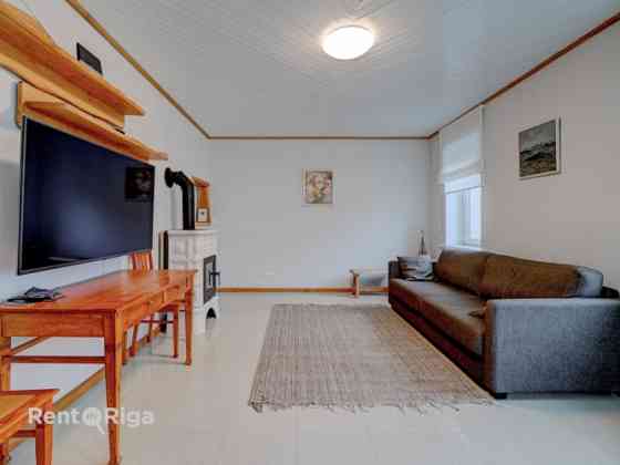 Уютный дом с террасой и садом в Шампетерисе  Предлагаем в аренду уютный и Rīga