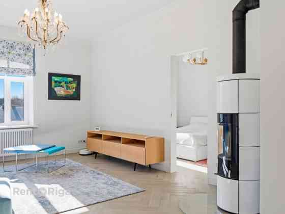 Четырехкомнатная квартира, сочетающая тишину и динамику города.  По адресу: улица Рига