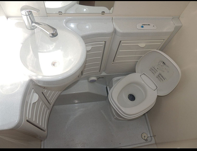 Прекрасный и очень ухоженный прицеп KIP 440 Grey-Line с двумя зонами отдыха, тентом, 3-точечным... Rīga - foto 6