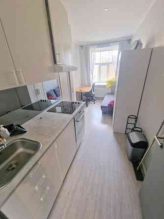 Фасадный дом, реновированный дом, закрытый двор, вход с улицы, лестничная клетка Rīga