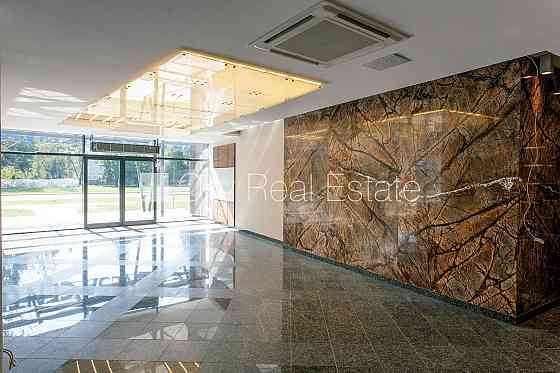 Новостройка, фасадный дом, плата за обслуживание одного квадратного метра в Rīga