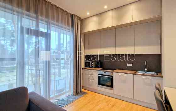 Земля в собственности, новостройка, фасадный дом, количество квартир в здании 4 Рига