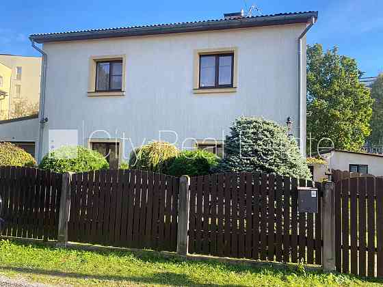 Частный дом, стены из керамзитных блоков, фасад с декоративной штукатуркой, на Rīga