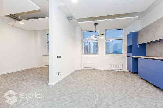 Стильный офис с живописным видом на Даугаву.  Общая площадь 341 м2. Офис расположен Рига