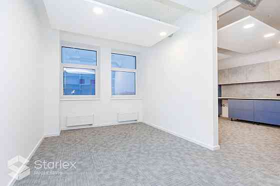 Стильный офис с живописным видом на Даугаву.  Общая площадь 341 м2. Офис расположен Рига