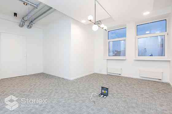 Стильный офис с живописным видом на Даугаву.  Общая площадь 341 м2. Офис расположен Рига