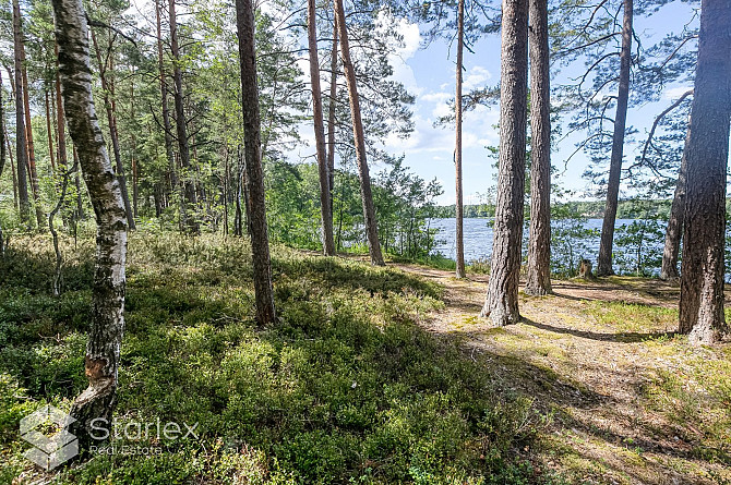 В живописном месте на берегу самого озера Лангстини продается уникальный Рижский район - изображение 10