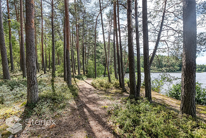 В живописном месте на берегу самого озера Лангстини продается уникальный Рижский район - изображение 9