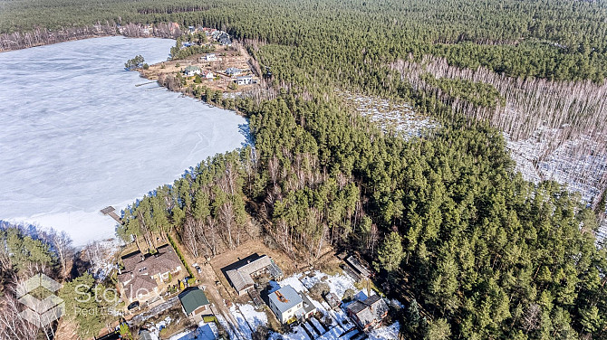 В живописном месте на берегу самого озера Лангстини продается уникальный Рижский район - изображение 14