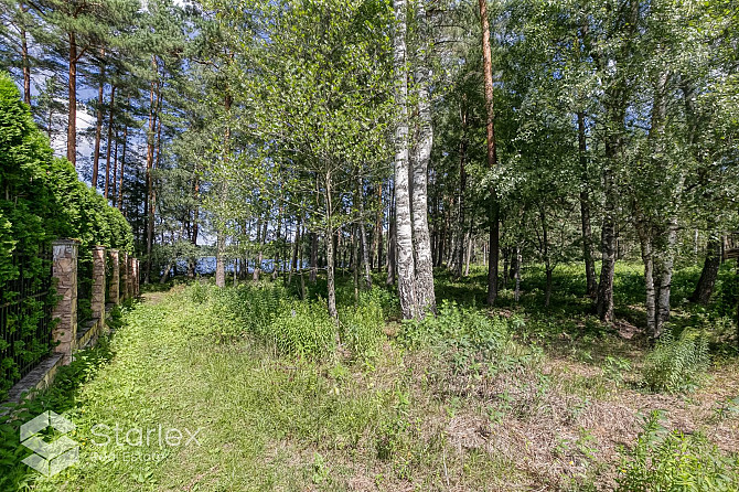 В живописном месте на берегу самого озера Лангстини продается уникальный Рижский район - изображение 12