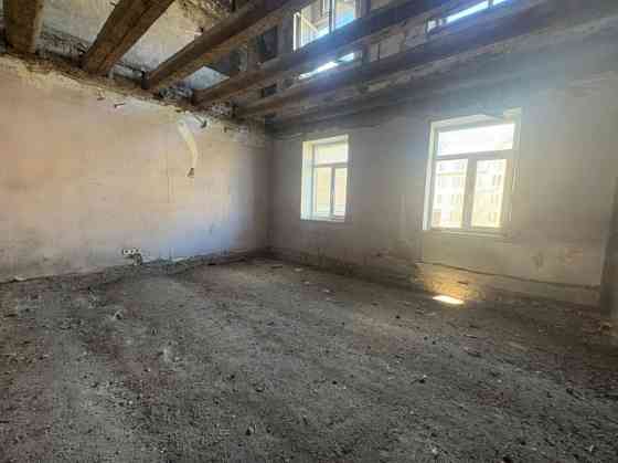 Инвестиционный объект в центре Риги с потенциалом развития  Продаётся здание с Рига