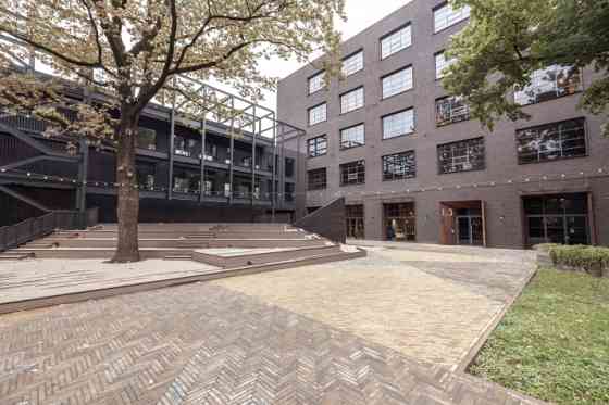 A unique designer office in an urban setting  large windows, spacious terraces, and a convenient loc Рига