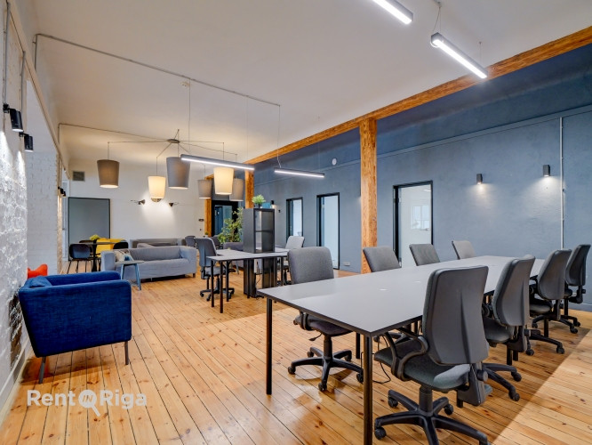 Office with a creative industrial atmosphere  high ceilings, wooden plank floors, exposed wooden bea Рига - изображение 8