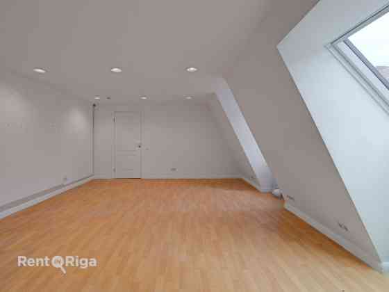 Two-Level Apartment in Jacob's Barracks  The first level features a spacious kitchen, a separate bed Rīga