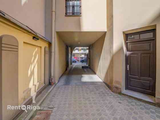 The apartment is located at 22 Skolas Street.  The apartment is in fair condition and requires cosme Рига