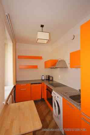 Furnished two-bedroom apartment in the very center of the city, which at the same time allows you to Рига