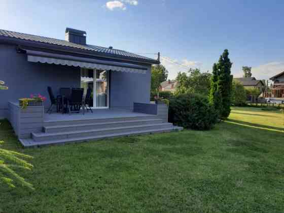 For long term rent: a compact, very cozy and tastefully furnished house with a terrace. The house is Cигулда