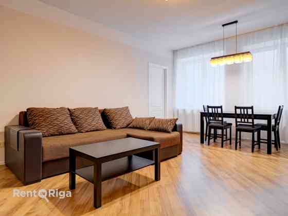 Furnished two-bedroom apartment in the very center of the city, which at the same time allows you to Рига