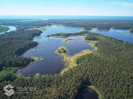 Эксклюзивный земельный участок площадью 74 га состоящий из озера и соснового Rīgas rajons