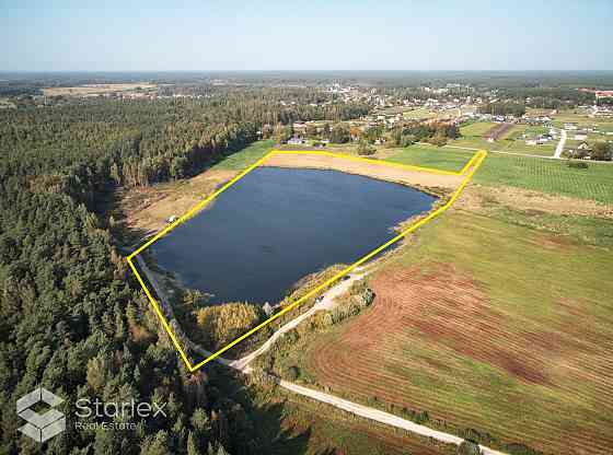 Продается земельный участок с частным озером под застройку частных домов в Малпилская вол.