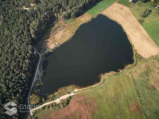 Продается земельный участок с частным озером под застройку частных домов в Малпилская вол.