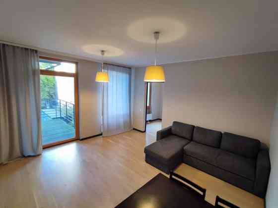 A modern, partially furnished 3-room apartment for rent in the new project on Alauksta street 9. The Rīga