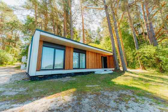 Полностью готовый модульный дом может быть установлен на вашем участке уже через Rīga