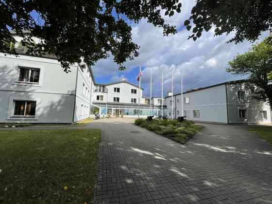 Open-plan office on the 6th and 7th floors of the building.  On the 6th floor, there are two open wo Rīga