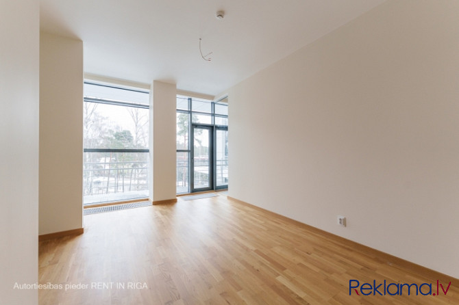 Apartamenti ar satreicošu panorāmas skatu un ar plašu terasi, unikālā projektā pašā Rīga - foto 16