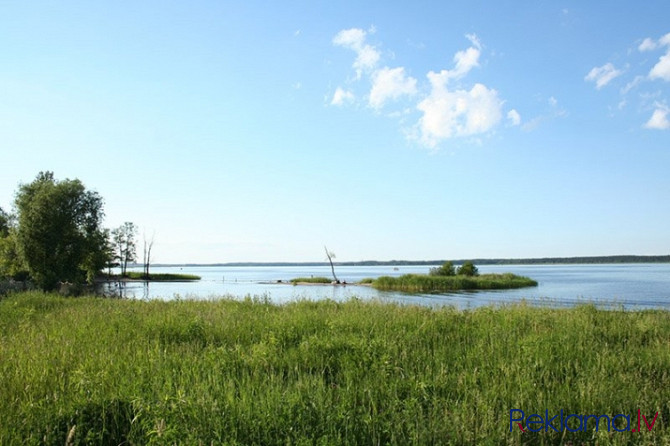 Продается земля на самом берегу озера Кишезерс со стороны Риги. - Можно строить Рига - изображение 1