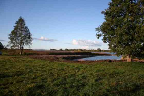 Земля для строительства частных домов  на берегyЛиелупе, в 20 км от Риги, недалеко Rīgas rajons