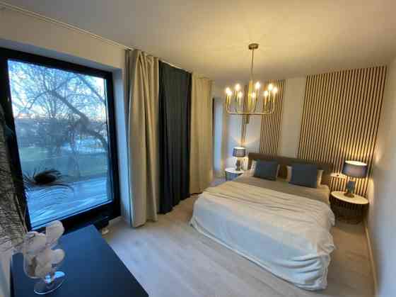 Квартира с волшебным видом!  Просторные панорамные окна открывают вид на Rīga