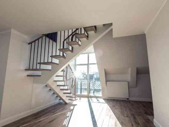Īrei pieejams 4- istabu dzīvoklis klusajā centrā- jaunajā projektā Futuris.  Pārdomāts dzīvokļa plān Рига